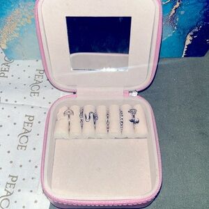 Pink jewelry box with included sterling silver rings!
